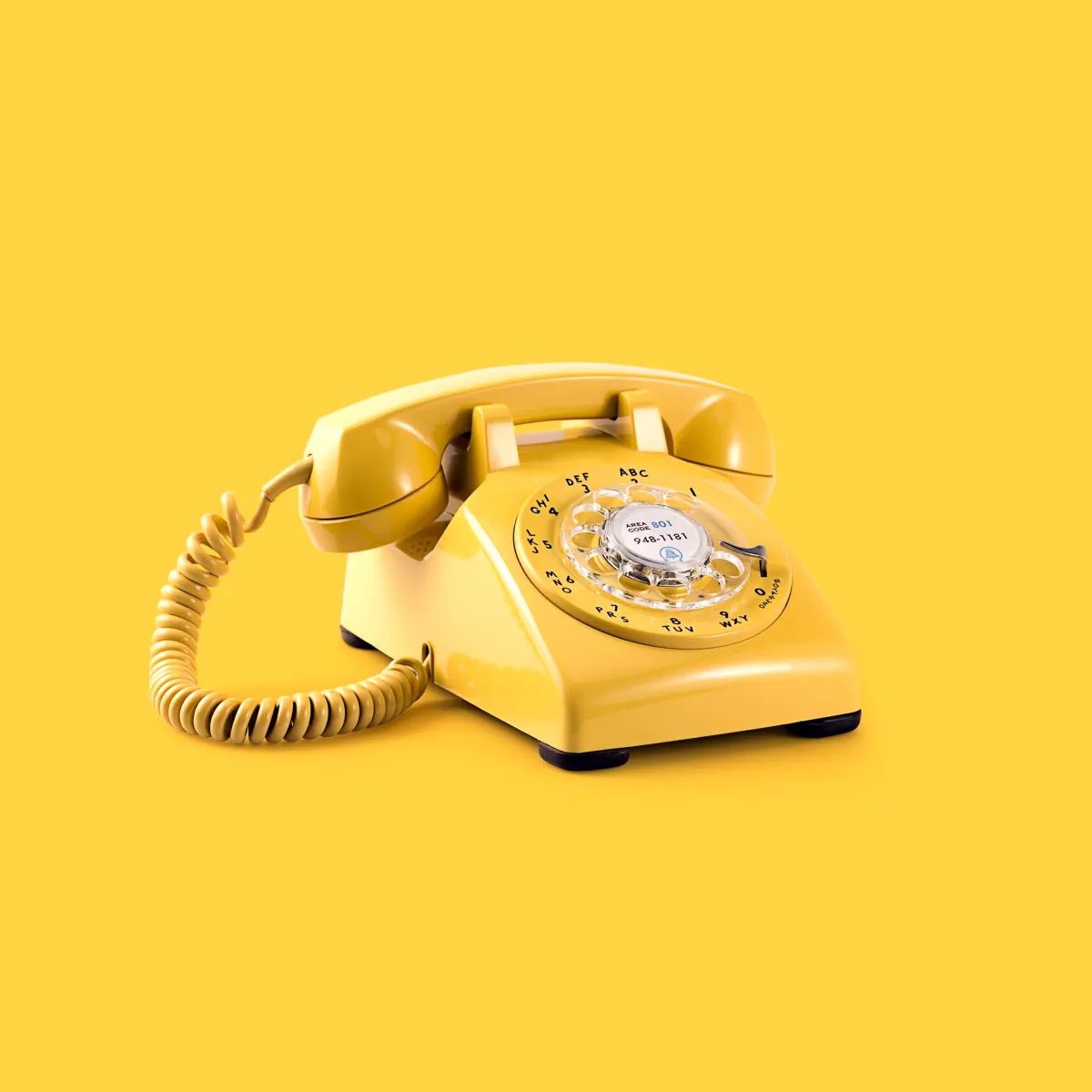 Gele draaischijftelefoon